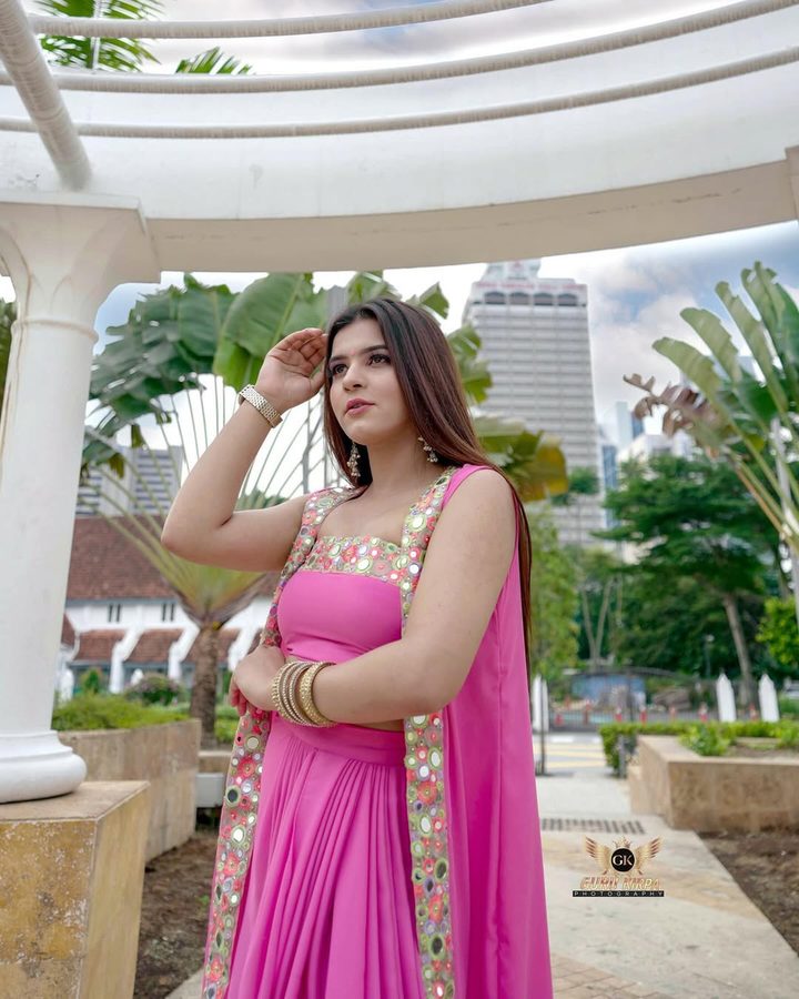 Mehak Shalle in a pink mirror-work outfit